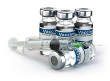 Vaccine in vial with syringe. Vaccination concept.